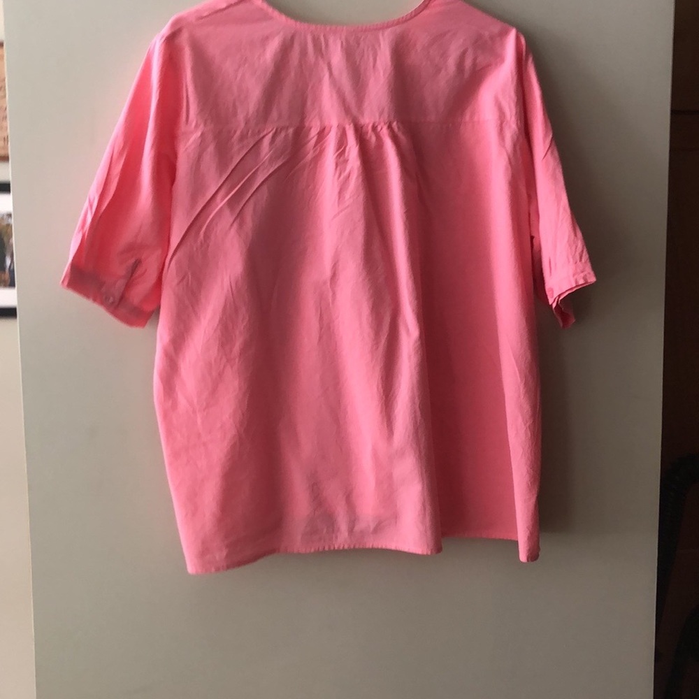Women’s L pink top with pink embroidery.